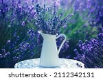 Lavender Flowers In White Jar...