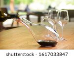 Small photo of Wine decanter. Decanting wine ensures that the sediment stays in the bottle and you get a nice clear wine and second and more everyday reason to decant is to aerate the wine.