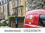 Small photo of LONDON- MARCH, 2019: A Royal Mail van parked on residential street, the UK's major postal services and courier company