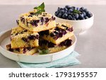 Small photo of Blueberry crumble topping coffeecake, sliced on plate