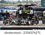 Small photo of July 17, 2023 - Loudon, NH, USA: NASCAR Cup Driver William Byron (24) and crew make a pit stop for the Crayon 301 at the New Hampshire Motor Speedway in Loudon NH.