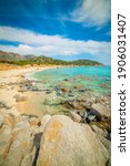 Small photo of Cloudy sky over Porto Sa Ruxi beach in Sardinia, Italy