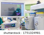 Small photo of Anaesthetic Machine and Patient Monitoring System inside modern operating room. Anaesthesia Workstation with the Ventilation Breathing and Gas Scavenging Systems Medical Equipment in close up.