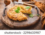 Spanish omelet (Tortilla de patatas) with potatoes and onion, typical Spanish cuisine. 