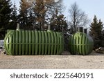Small photo of New Water Tanks For Multiple Purposes Awaiting to be Buried underground next to new Objects