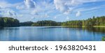 Beautiful forest lake in Russia. Panoramic view of beautiful lake landscape in Pskov region, Russia.