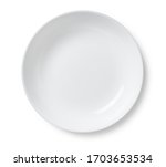 White plate placed on a white...