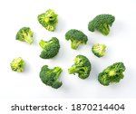 Cut broccoli placed on a white background. View from above