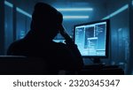 Small photo of Computer Hacker in Hoodie. Obscured Dark Face. Concept of Hacker Attack, Virus Infected Software, Dark Web and Cyber Security.