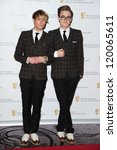 Small photo of Dougie Poynter and Tom Fletcher in the press room for the BAFTA Children's Awards 2012 at the London Hilton, London. 25/11/2012 Picture by: Steve Vas