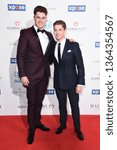 Small photo of LONDON, UK. April 08, 2019: Cutis & AJ Pritchard arriving for the Football for Peace initiative dinner by Global Gift Foundation at the Corinthia Hotel, London. Picture: Steve Vas/Featureflash