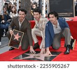 Small photo of LOS ANGELES, CA. January 30, 2023: Kevin Jonas, Nick Jonas and Joe Jonas at the Hollywood Walk of Fame Star ceremony. Picture: Paul Smith-Featureflash