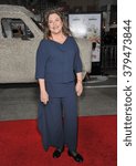 Small photo of LOS ANGELES, CA - NOVEMBER 3, 2014: Kathleen Turner at the premiere of her movie "Dumb and Dumber To" at the Regency Village Theatre, Westwood.