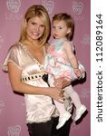 Small photo of Dayna Devon and daughter Emmi at the Hollywood Premiere of "My Little Pony Live! The World's Biggest Tea Party". Kodak Theatre, Hollywood, CA. 03-15-07