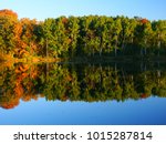 Beautiful fall colors reflect off a pond at Kettle Moraine State Forest in Wisconsin