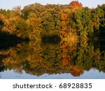 Beautiful fall colors reflect off a pond at Kettle Moraine State Forest in Wisconsin.