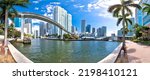 Small photo of Miami downtown skyline and futuristic mover train above Miami river panoramic view, Florida state, United States of America