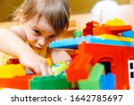 Small photo of Child in playgroup of kindergarten playing