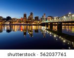 Portland Oregon downtown skyline along Willamette River during blue hour winter night scene