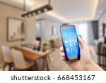 mobile phone with apps on smart home in modern dining room