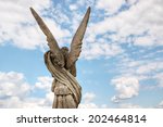 Angel Statue With Blue Sky...
