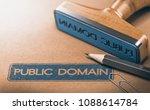 3D illustration of a rubber stamp with the text public domain stamped on paper background