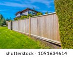 Wooden fence. Separate and protect private property.