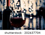 Red Wine Glass Near Bottle With ...