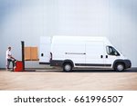 Courier is loading the van with parcels