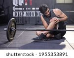 caucasian  athlete grab his... | Shutterstock . vector #1955353891