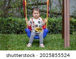 asian baby girl have fun... | Shutterstock . vector #2025855524