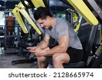 caucasian man playing mobile... | Shutterstock . vector #2128665974