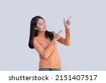 isolated asian woman pointing... | Shutterstock . vector #2151407517