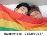 asian gay couple sleep on the... | Shutterstock . vector #2152590857