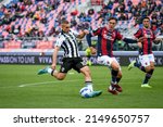 Small photo of Bologna, Italy, April 24, 2022, Udinese's Gerard Deulofeu in action against Bologna's Luis Binks during italian soccer Serie A match Bologna FC vs Udinese Calcio