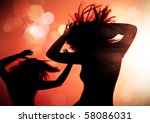dancing silhouettes of woman in a nightclub