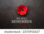 Small photo of We Will Remember 11th November inscription with Poppy flower on rusty iron background. Decorative flower for Remembrance Day. Memorial Day. Veterans day.