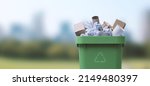 Small photo of Garbage can full of paper waste, recycling and separate waste collection concept