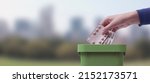 Small photo of Woman putting expired meds in a waste bin, natural landscape in the background