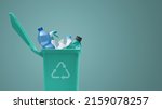 Small photo of Recycling bin full of plastic waste, separate waste collection concept