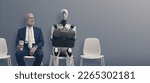 Man and ai robot waiting for a...