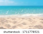 Sand with blurred tropical sandy beach bokeh background, Summer vacation and product advertisement concept