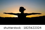 silhouette of a woman against a ... | Shutterstock . vector #1825622324