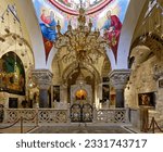 Small photo of JERUSALEM, ISRAEL - June 23, 2023: The Armenian Chapel of the Division of the Raiment or the Robes inside the Church of Holy Sepulchre in the Christian Quarter old city East Jerusalem, Israel