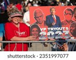 Small photo of Milwaukee, Wisconsin, USA - August 23, 2023: A supporter of former President Donald Trump holds a protest sign at the entrance to the first Republican Debate for the 2024 Presidential election.