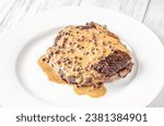 Steak au poivre - french steak with peppercorn sauce