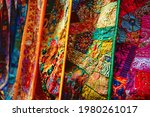 Small photo of Indian patchwork fabric with traditional Indian patterns close up. Jasialmer, Radjasthan, India Exotic Patchwork Quilt
