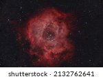 Small photo of Rosette nebula in the unicorn constellation, recognizable by the strong emission of red H-alpha radiation from the shape that resembles that of a rose flower