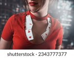 Small photo of poker girl in a dress with a neckline in which poker cards look seductively on a woman's chest. poker gambling. women's neckline