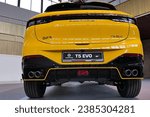 Small photo of NITRA, SK - SEPTEMBER 29, 2023: Rear view of yellow compact crossover (CUV) chinese car Dongfeng T5 EVO, sportier variant of Forthing T5, displayed on car expo in Nitra, Slovakia.